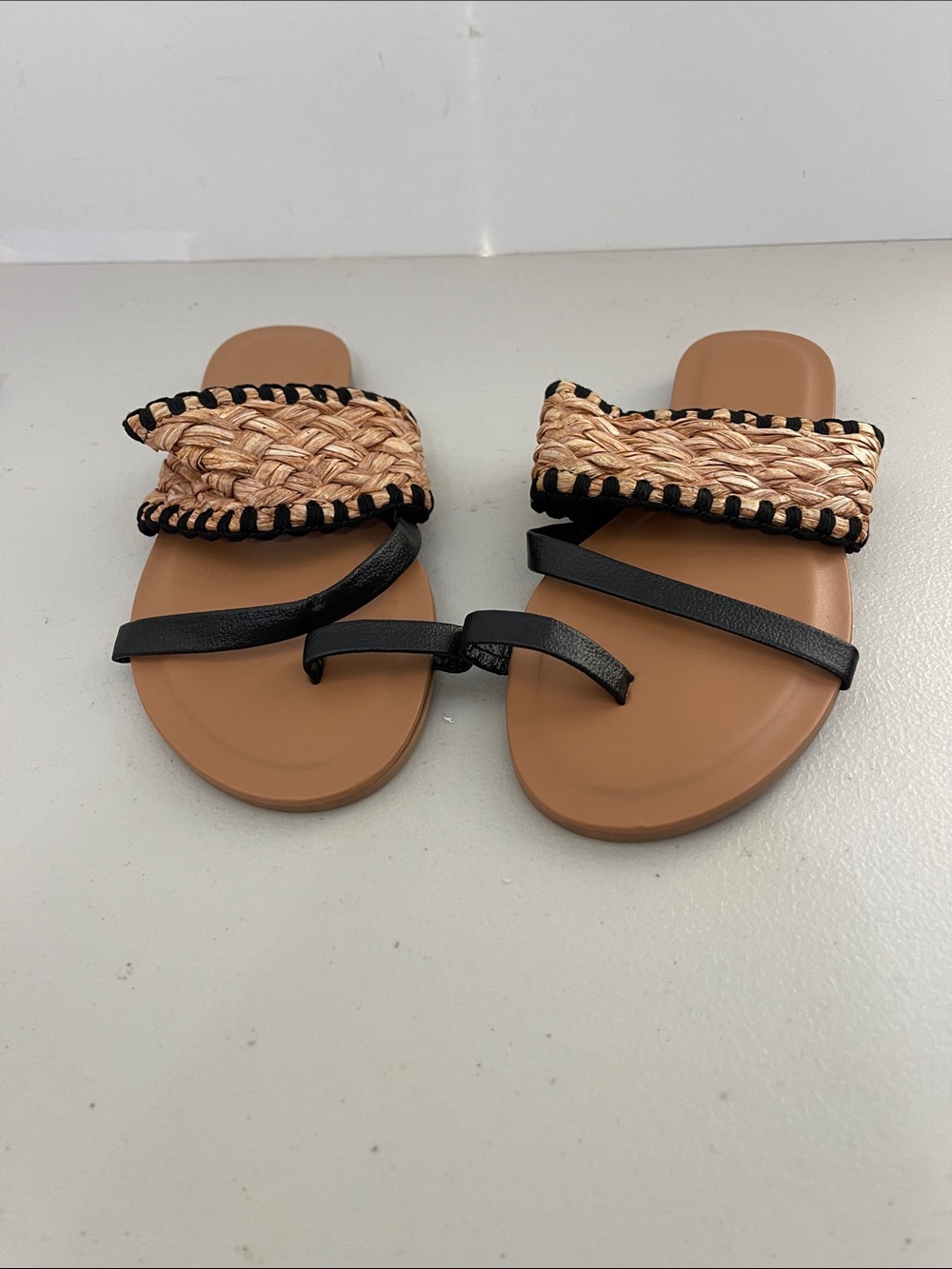 Woven Straw Slide Sandals with Black Straps